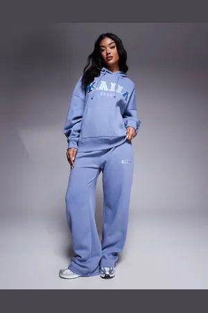 Kaiia Joggers claro de pernera ancha con logo bordado de (parte de un conjunto)