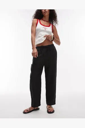 MANGO Pantalones negros con lazada en la cintura de lino de