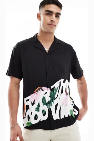Dr Denim Camisa resort negra holgada de manga corta con estampado floral "Times" Madi de