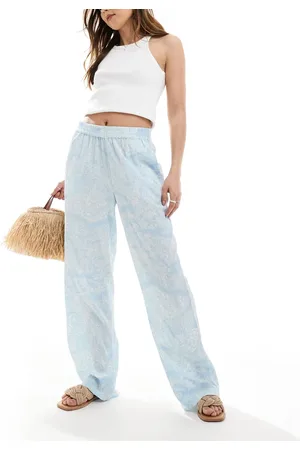 VERO MODA Pantalones azul pálido de pernera ancha sin cierres con estampado floral de
