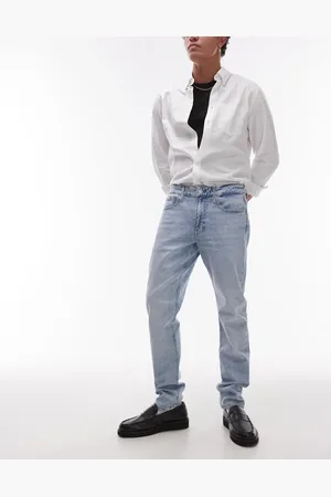 Calvin Klein Vaqueros tapered de corte slim con lavado claro de -Azul