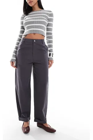 ASOS Pantalones de corte tapered con detalle de bajos vueltos de