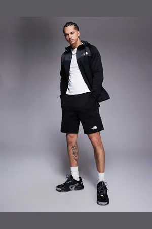 The North Face Pantalones cortos negros técnicos de felpa Mountain Athletics de