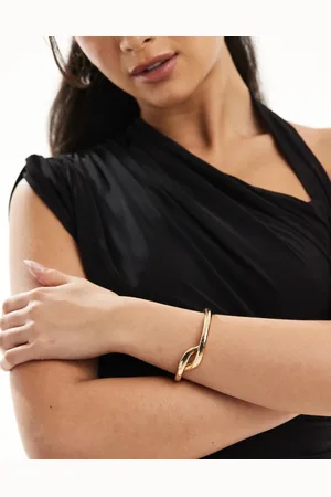 Accessorize Pulsera dorada rígida sin cierres con detalle anudado retorcido de