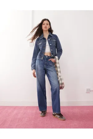 Miss Selfridge Vaqueros holgados con lavado azul y parches con estampado floral de