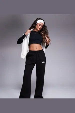 Kaiia Joggers negros de pernera ancha con logo bordado de Petite