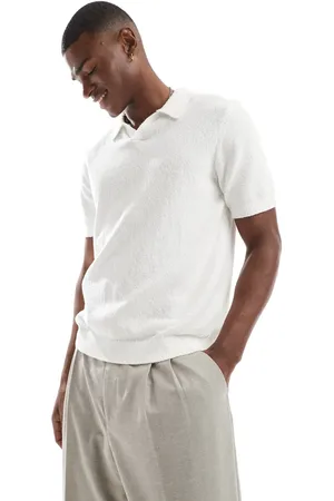 JACK & JONES Polo blanco con muesca en el cuello y textura de bouclé de Premium