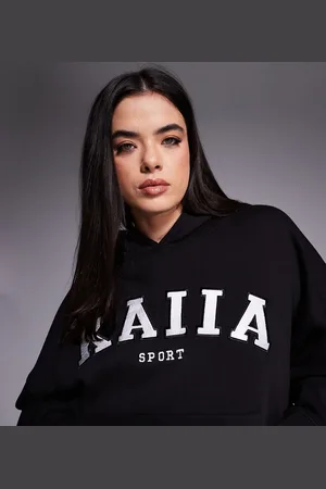 Kaiia Sudadera negra extragrande con capucha y logo bordado de Sport Plus (parte de un conjunto)