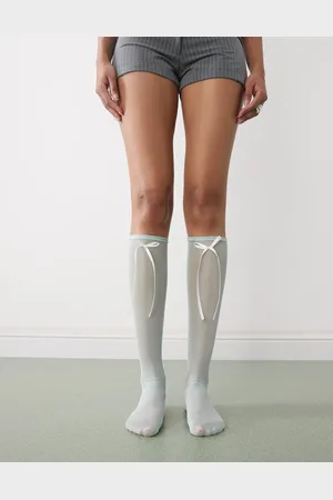 Reclaimed Calcetines por la rodilla azules con lazos de malla de