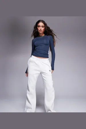 Kaiia Joggers claro de pernera ancha con logo bordado de Petite