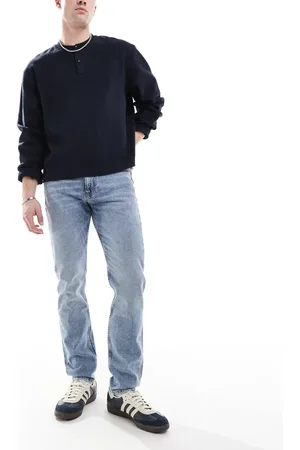 Calvin Klein Vaqueros tapered de corte slim con lavado claro de -Azul