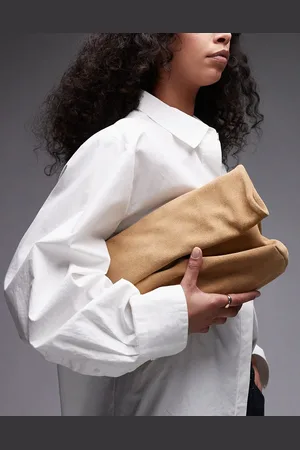 & OTHER STORIES Bolso clutch con diseño plegado y correa de hombro desmontable de ante de