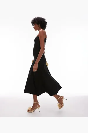 MANGO Vestido midi con escote palabra de honor y falda voluminosa de punto de