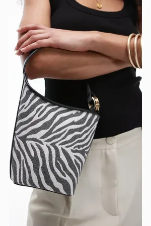 MANGO Bolso bombonera con estampado de cebra de