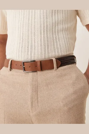 ASOS Cinturón negro y elástico de estilo casual con diseño entretejido de cuero sintético de