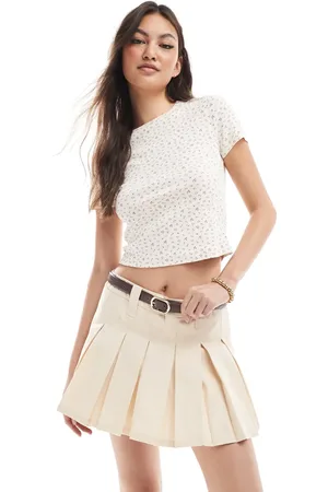 Monki Minifalda plisada con diseño superpuesto y capa inferior blanca con el borde sin rematar de -Neutro
