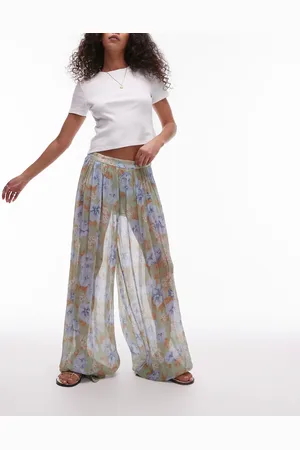MANGO Pantalones azul pálido de corte voluminoso con estampado floral de