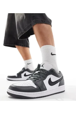 Jordan Zapatillas de deporte blancas y grises Air 1 Low de Nike