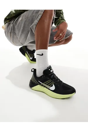 Nike Zapatillas de deporte negras y amarillas Lunar Roam de