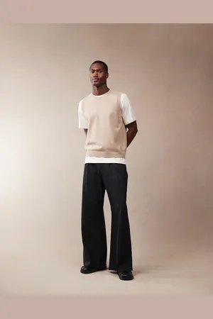 ASOS Pantalones de vestir negros de pernera suelta con pinzas delanteras de mezcla de lino de