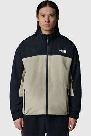 The North Face Chaqueta de chándal gris y negra Hmlyn de