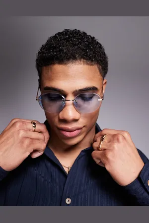 ASOS Gafas de sol con montura al aire, patillas doradas y lentes azules degradadas redondas de