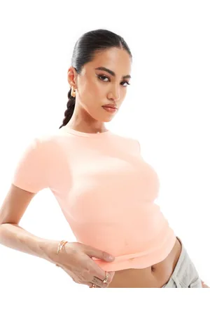 River Island Camiseta color melocotón con diseño encogido de -Rosa