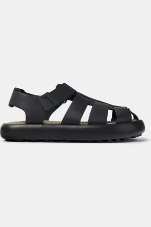 Camper Sandalias negras con tira talonera de cuero de