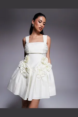 ASOS Vestido corto amarillo pastel con cintura entallada, pecho plisado y flores de satén de algodón de