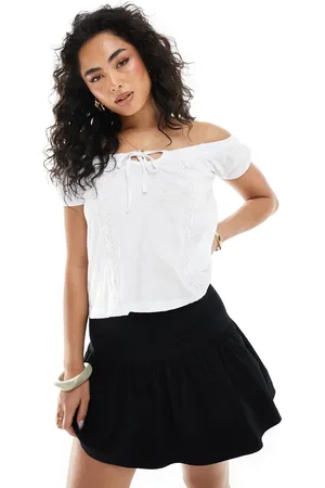 Miss Selfridge Blusa blanca de estilo bohemio de punto liso con ribete de encaje de