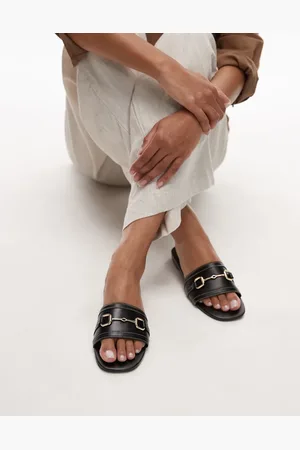 MANGO Sandalias negras estilo mules con detalles dorados de