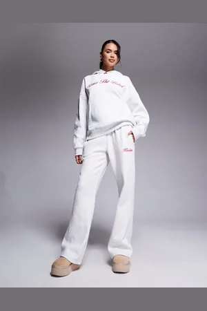 Kaiia Joggers grises de pernera ancha con logo bordado y detalle de lazo en la cinturilla de (parte de un conjunto)