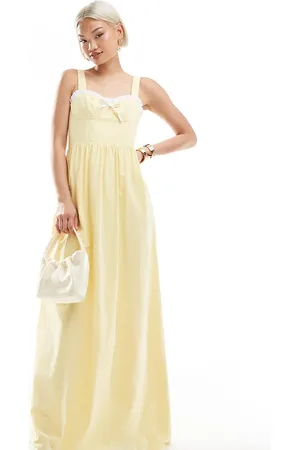 The Frolic Vestido largo con escote corazón, detalle de lazo y ribete de volante en contraste exclusivo de