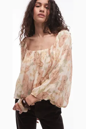 MANGO Blusa amarillo tenue de corte voluminoso con estampado floral de