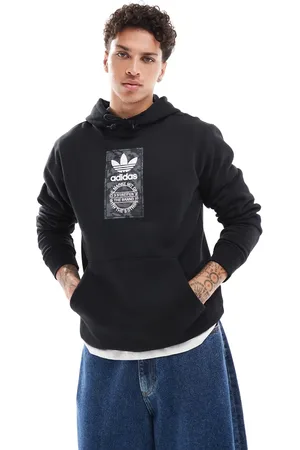 adidas Sudadera negra con capucha y detalle de camuflaje de