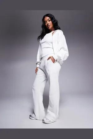 Kaiia Joggers blancos de pernera ancha con logo bordado de (parte de un conjunto)