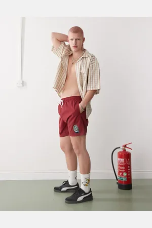 Santa Cruz Shorts de baño rojos con estampado gráfico de media luna con logo de