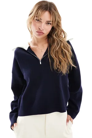MANGO Jersey con cuello alto y media cremallera de