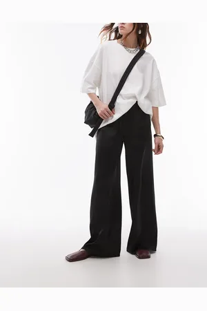 Topshop Pantalones negros de pernera ancha con lazada en la cintura de satén de