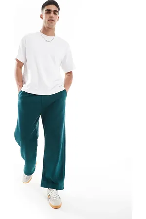 Hollister Joggers verdes muy holgados con costuras en contraste de