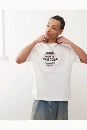 Timberland Camiseta blanca extragrande con estampado gráfico "Born In" de