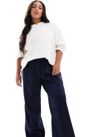 Pieces® Pantalones azul marino de pernera ancha con franja lateral de Pieces Curve