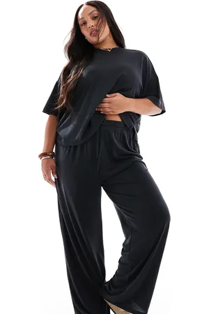 Pieces® Pantalones negros lisos de pernera ancha de tejido muy suave de Pieces Curve (parte de un conjunto)