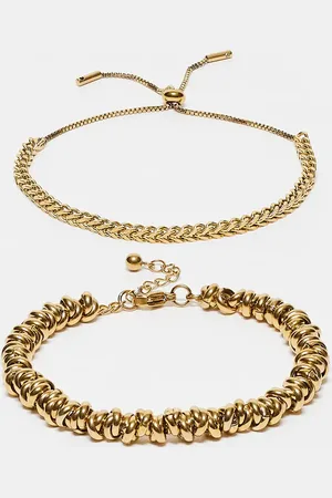 ASOS Pack de 2 pulseras doradas de cadena y cuentas de acero inoxidable resistente al agua de