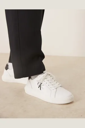 Calvin Klein Zapatillas de deporte blancas y negras con suela gruesa cupsole de cuero de -Blanco