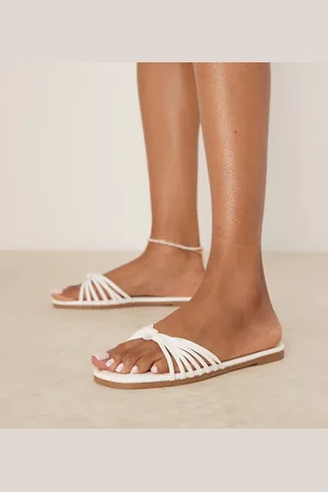 Raid Sandalias blancas planas con diseño de tiras y detalle anudado Bella de