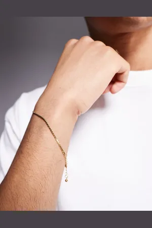 ASOS Pulsera dorada estilo cadena retorcida de acero inoxidable resistente al agua de