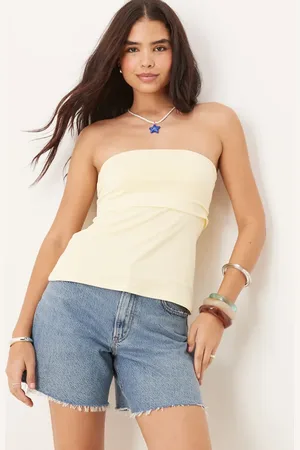 Abercrombie & Fitch Pantalones cortos vaqueros sueltos de talle alto con lavado medio y bajos deshilachados de Curve Love
