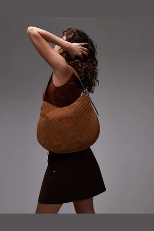 MANGO Bolso con monograma en relieve de cuero de