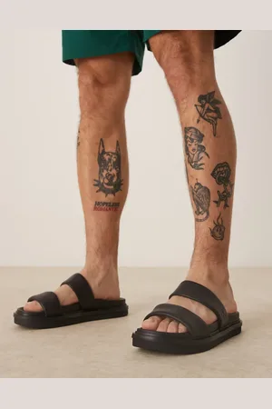 Calvin Klein Sandalias negras sin cierres con diseño de dos tiras de cuero de -Negro